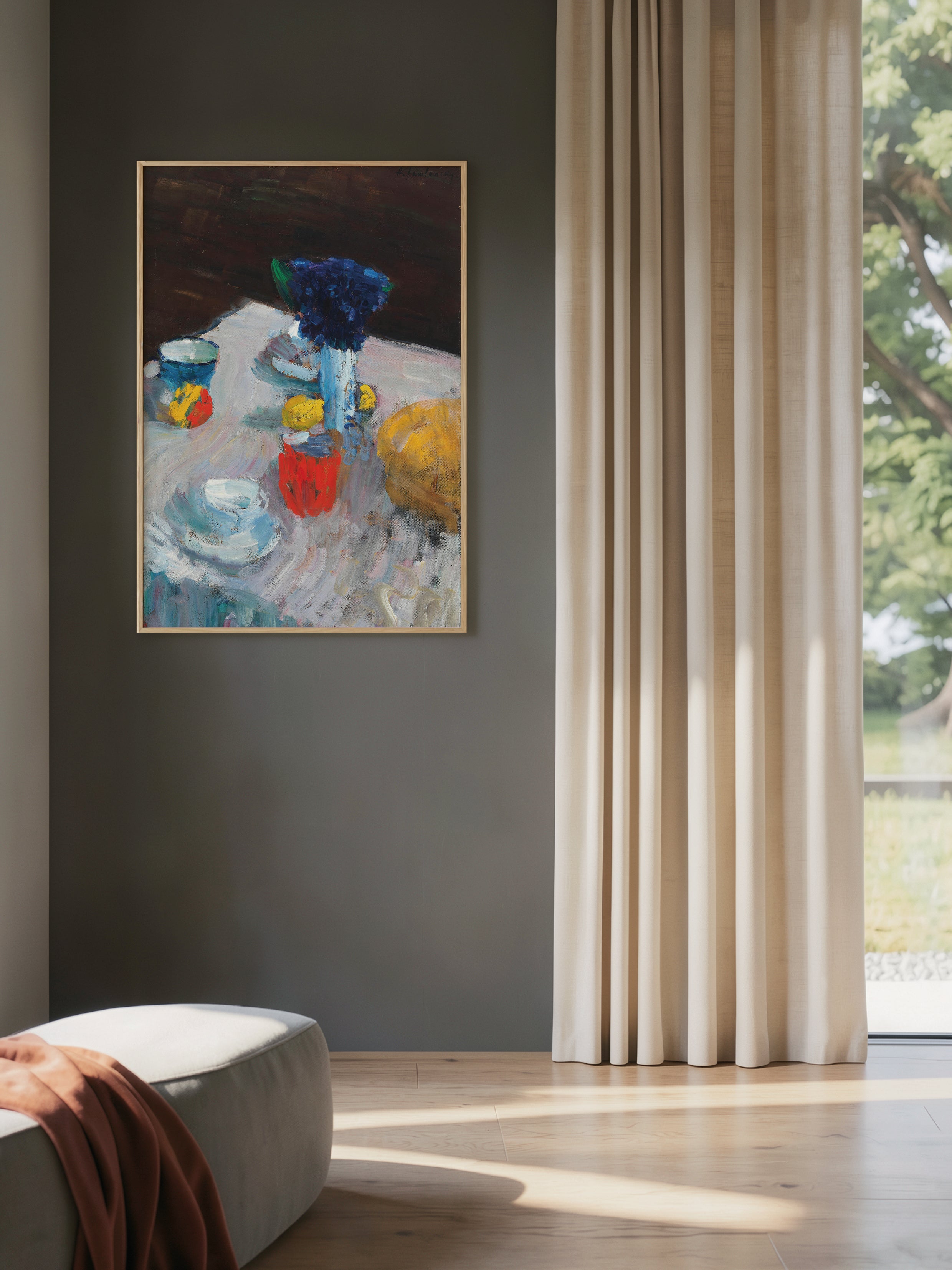 Framed painting on a gray wall with a window and curtain in the background